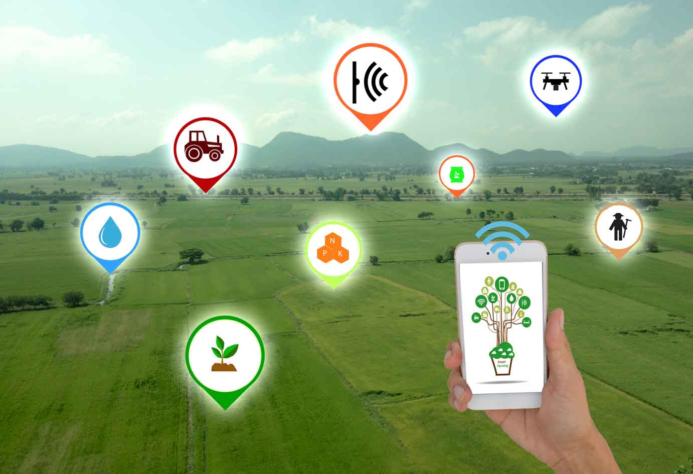 Smart farming. The farmer using application in phone to control and monitor conditions in the field